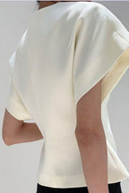 Marise | Topp skulpturell silhuett med gullspenne